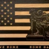 kneeling soldier with fallen soldier battlefield cross wood flag
