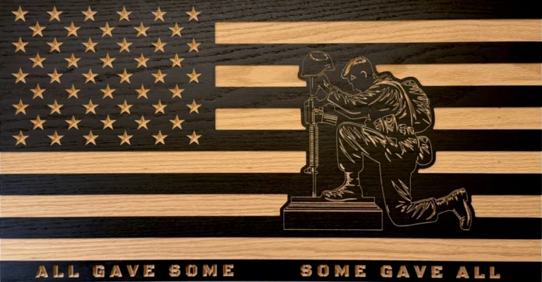 kneeling soldier with fallen soldier battlefield cross wood flag