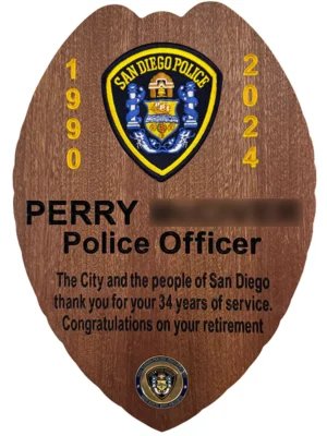 sdpd plaque in the shape of a badge. the plaque includes a recessed sdpd patch.