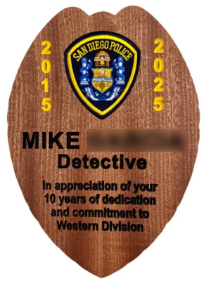 sdpd plaque in the shape of a badge. the plaque includes a recessed sdpd patch.